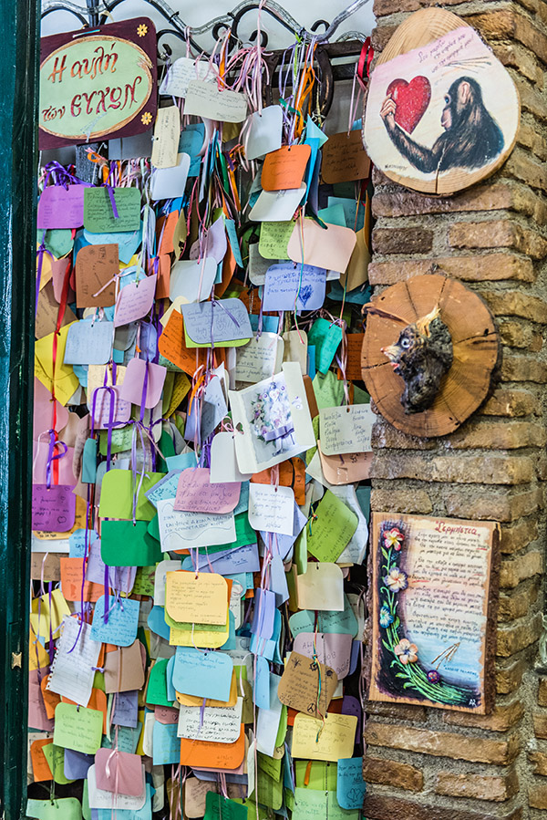 The wall of handwritten notes left by guests